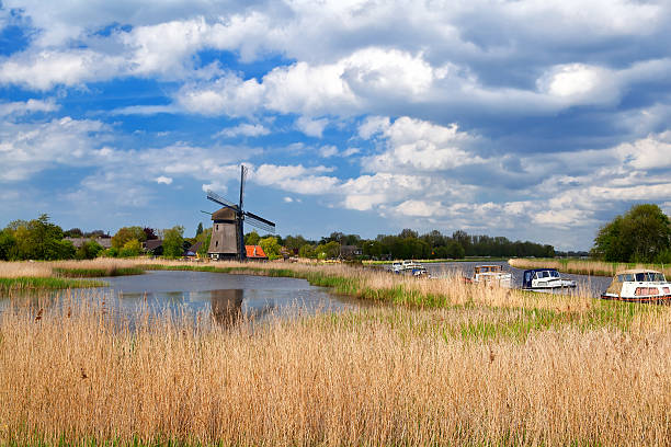windmill over blue sky in Alkmaar, North Holland