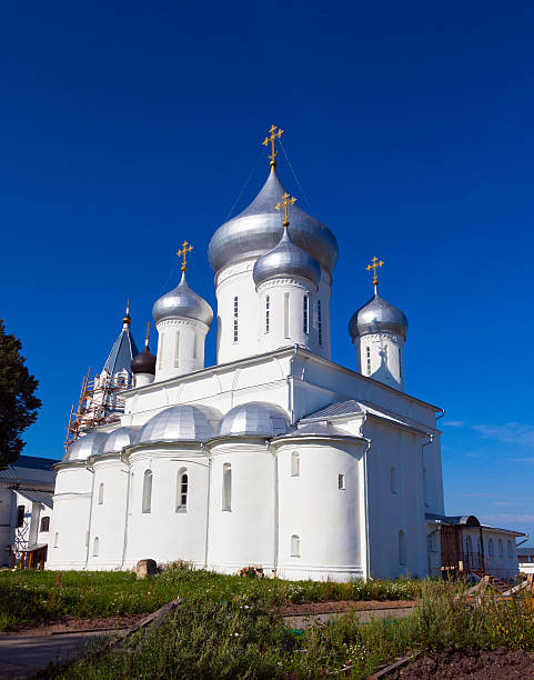istock white steeple church with three domes 178112381