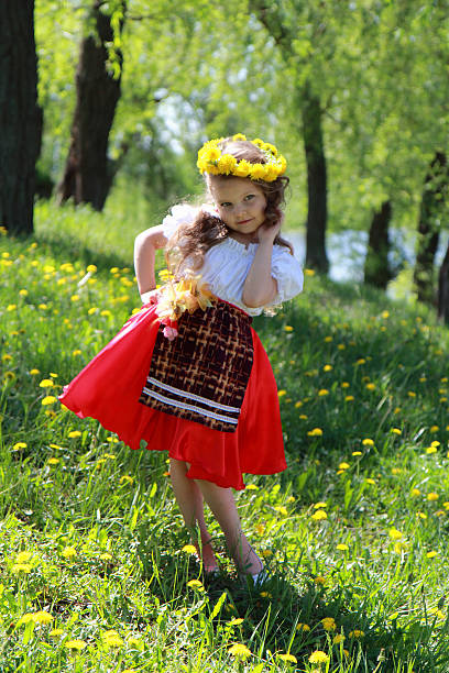 istock Little girl  on grass. 178112807