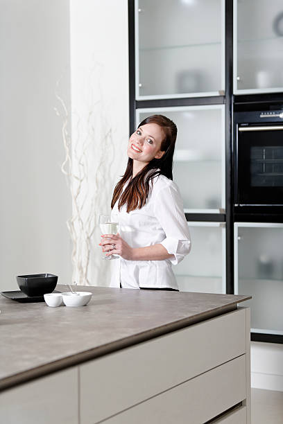 istock Woman in her stylish kitchen 178113091