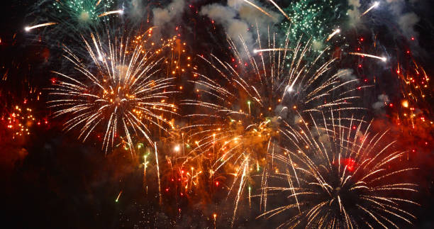 istock Red firework night background in dusk time celebrate national holiday. Countdown to new year 2024 festival party time event. Red Firework anniversary happy new year 2024, 4th of july holiday festival 1781136745