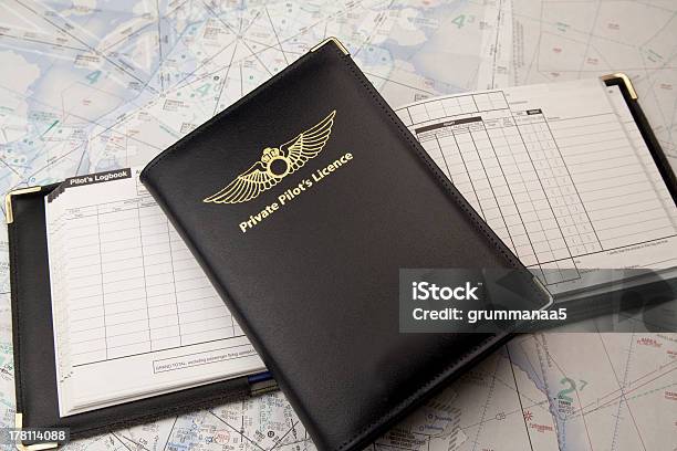 Private Pilots License On Logbook And Chart Stock Photo - Download Image Now - Diary, Pilot, Authority