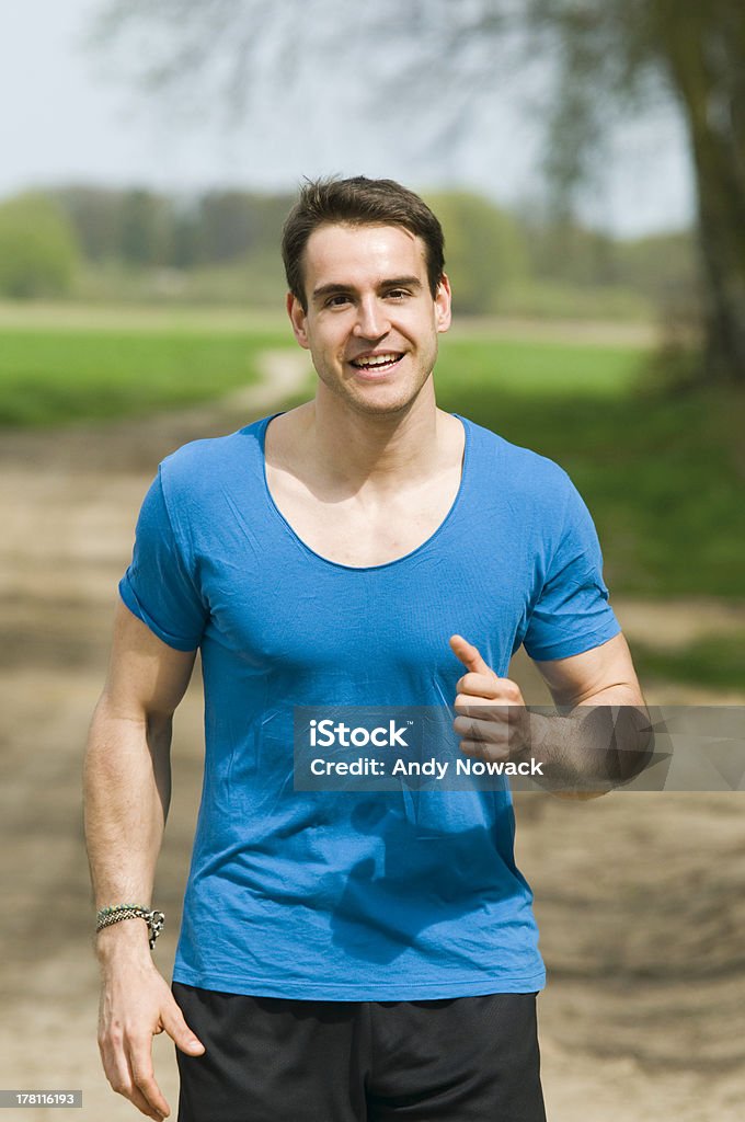 笑顔男性のジョギング - 1人のロイヤリティフリーストックフォト