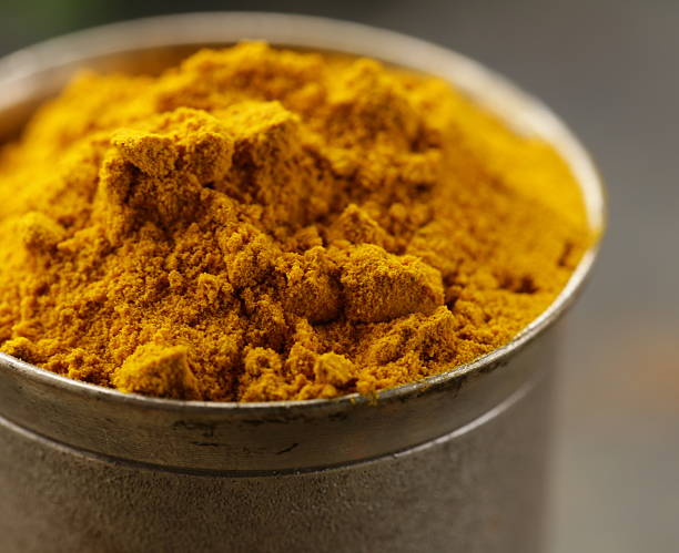istock curcuma spice in metal bowl macro shot soft focus 178116503