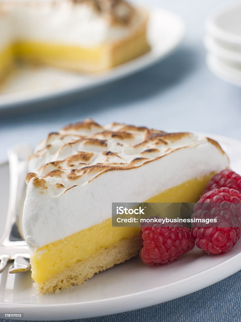 Slice Of Lemon Meringue Pie With Raspberries Slice Of Lemon Meringue Pie With Raspberries On The Side American Culture Stock Photo