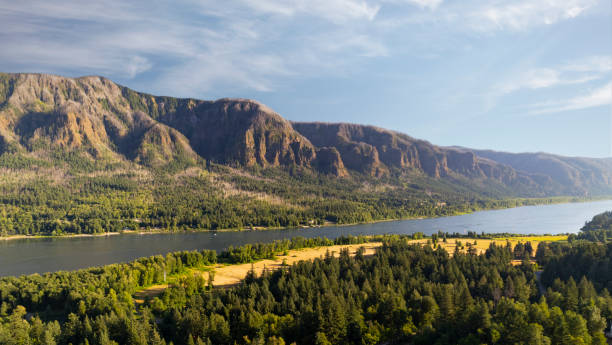 An aerial view of the cliffs above Ainsworth State park in Oregon from across the Columbia River in Washington.