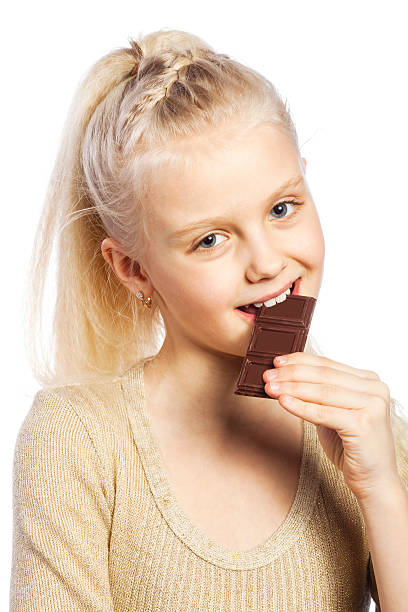 istock Beautiful girl biting chocolate. 178121181