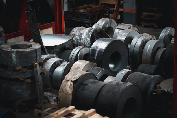 istock Rolls of metal sheet and galvanized inside the factory warehouse. 1781222457