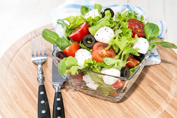 Portion of fresh and healthy Tomato-Mozzarella Salad