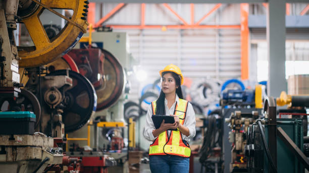 istock Industrial worker inspecting with tablet machine at factory machines. Technician working in the metal sheet company. 1781232185