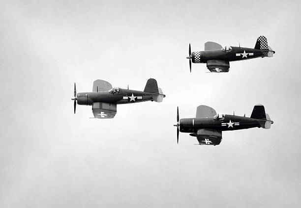 Old Navy fighter planes World War II era Navy fight airplanes in formation military airplane photos stock pictures, royalty-free photos & images