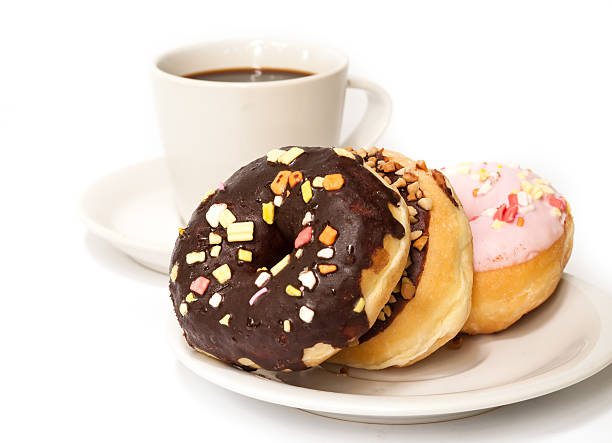 ホッ��トコーヒーのカップカプチーノます。 - donut caffeine coffee cream ストックフォトと画像