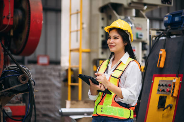 istock Industrial worker inspecting with tablet machine at factory machines. Technician working in the metal sheet company. 1781237140