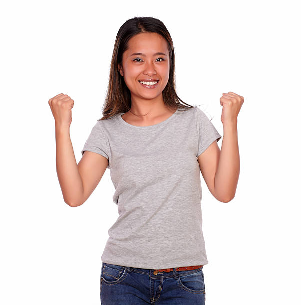 istock Asiatic charming young woman celebrating a victory 178125233