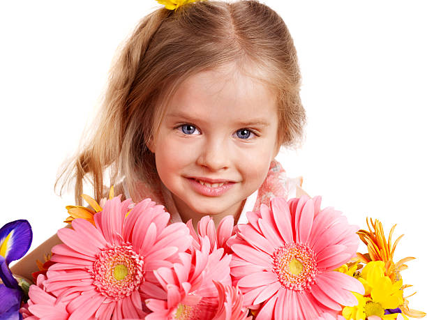 istock Happy child holding flowers. 178125663