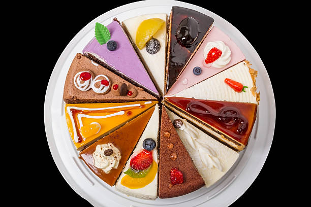 istock Twelve pieces of cake on black. 178125972