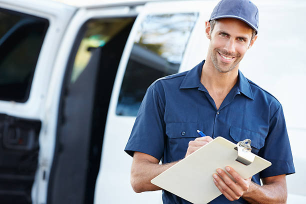 istock Portrait Of Delivery Driver With Clipboard 178126111