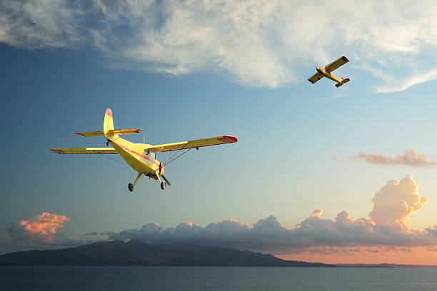 istock Two Yellow Aircrafts at Dusk 178126533
