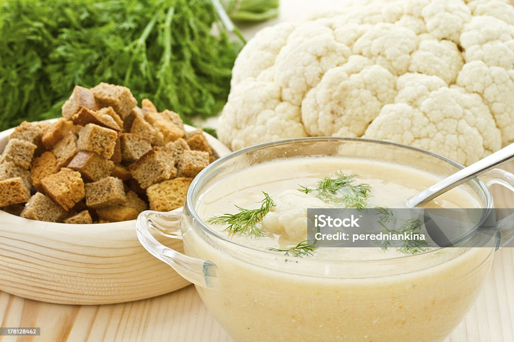 Soup Cream of cauliflower soup cauliflower puree and dill in a bowl Appetizer Stock Photo
