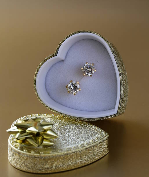 istock earrings stud with diamonds in a gold box 178128631