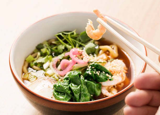 istock Broth and spoon filled with shrimps 178128983