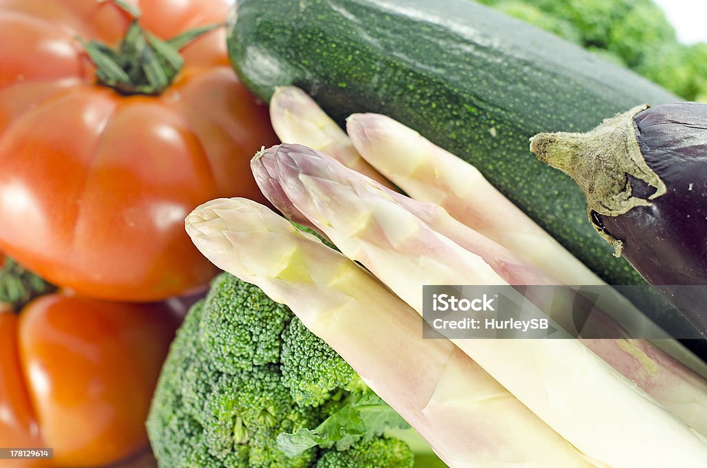 Vegetables closeup Vegetables closeup, tomatoes, asparagus, broccoli, zuchinni and eggplant Arrangement Stock Photo