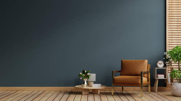 istock Dark blue living room interior with cozy leather armchair 1781299198