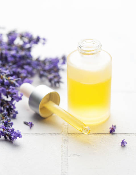 istock Lavender  natural essential oil and fresh lavender on a white tile background. 1781299728