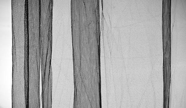 istock Abstract monochrome background texture of light tulle fabric 178131506