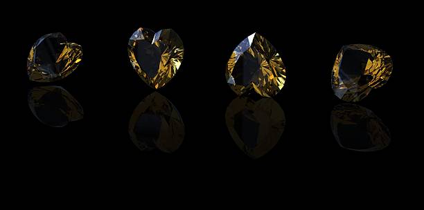 istock Heart shape gemstone on black. citrine. Yellow Sapphire 178132802