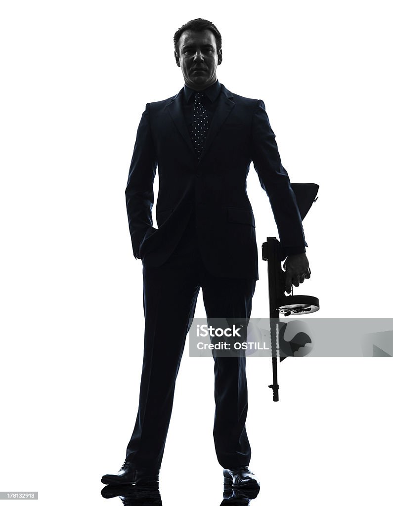gangster Mann hält thompson Maschinengewehr silhouette - Lizenzfrei Anzug Stock-Foto