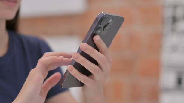 istock Close up of Female Hand Using Smartphone 1781342275