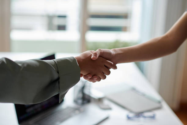 istock HR Manager and Applicant Shaking Hands 1781353510