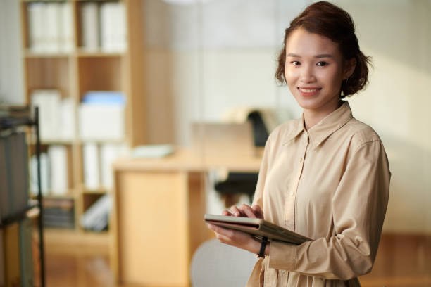 istock Young Businesswoman with Tablet Computer 1781356755