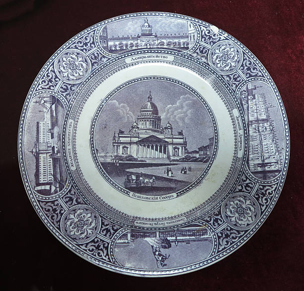 istock 19th Century vintage old plate with paintings isolated over whit 178135827