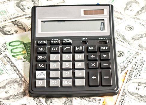 Business picture: calculator and money