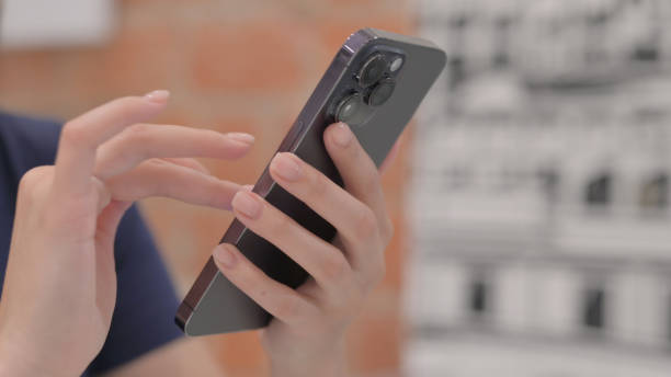 istock Close up of Female Hand Using Smartphone 1781372601