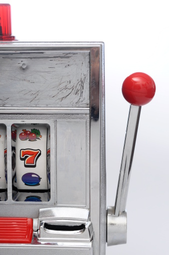 Slot machine and jackpot three seven on light background