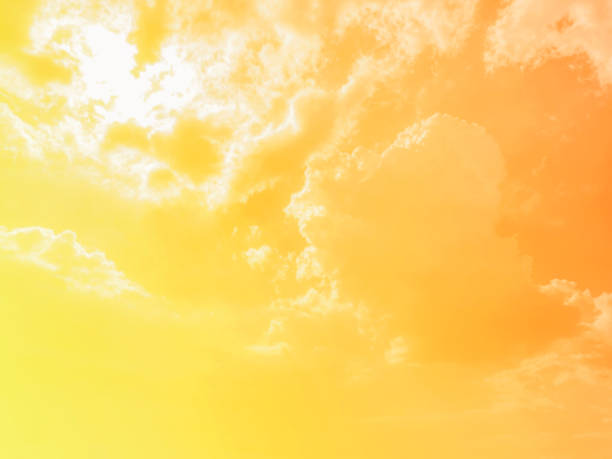 istock Golden yellow orange sky sunset with fluffy cloud. Summer pastel sky. 1781381053