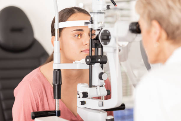 istock Eye, optometrist and eye exam in ophthalmologist office with optical machine to examine vision weak iris, pupil or lens of eyeball. Woman, optical clinic test and professional optician eye care test 1781386140