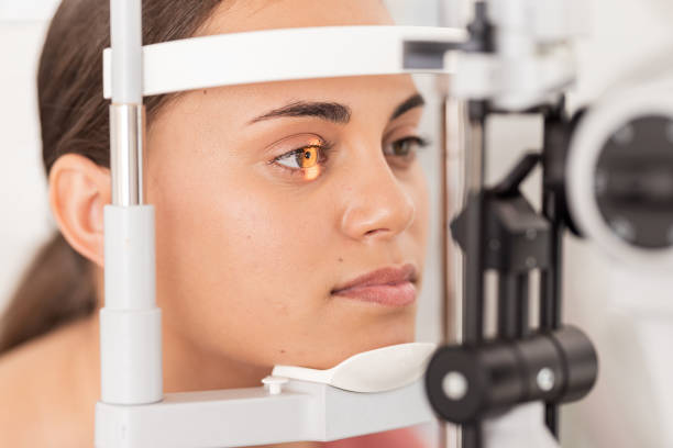 istock Vision, eyesight and woman gets ophthalmology eye exam with light on iris testing to see sight. Healthcare, medical insurance and eyes, girl getting healthy visual refraction eye test at clinic. 1781386145