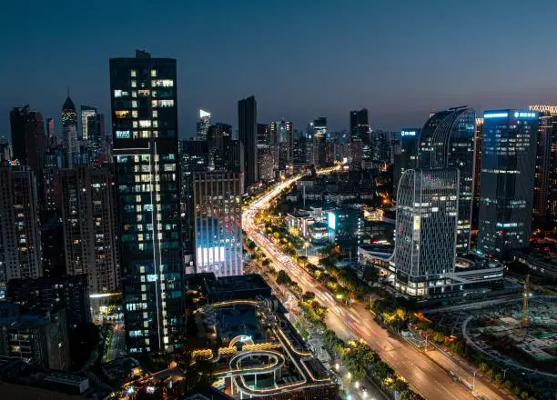 A stunning aerial view of the bustling metropolitan cityscape of Wuhan, China at night.