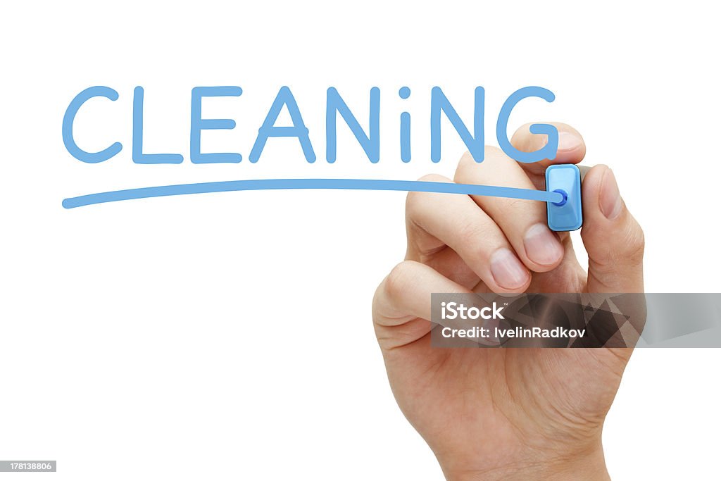 Cleaning Concept Hand writing Cleaning with blue marker on transparent wipe board. People Stock Photo