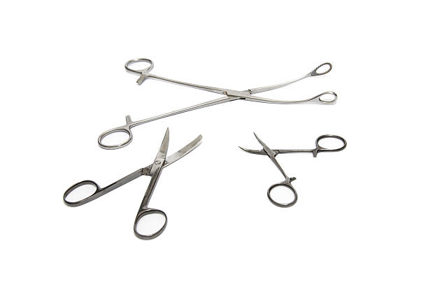 istock Medical Scissors over the white background 178140830