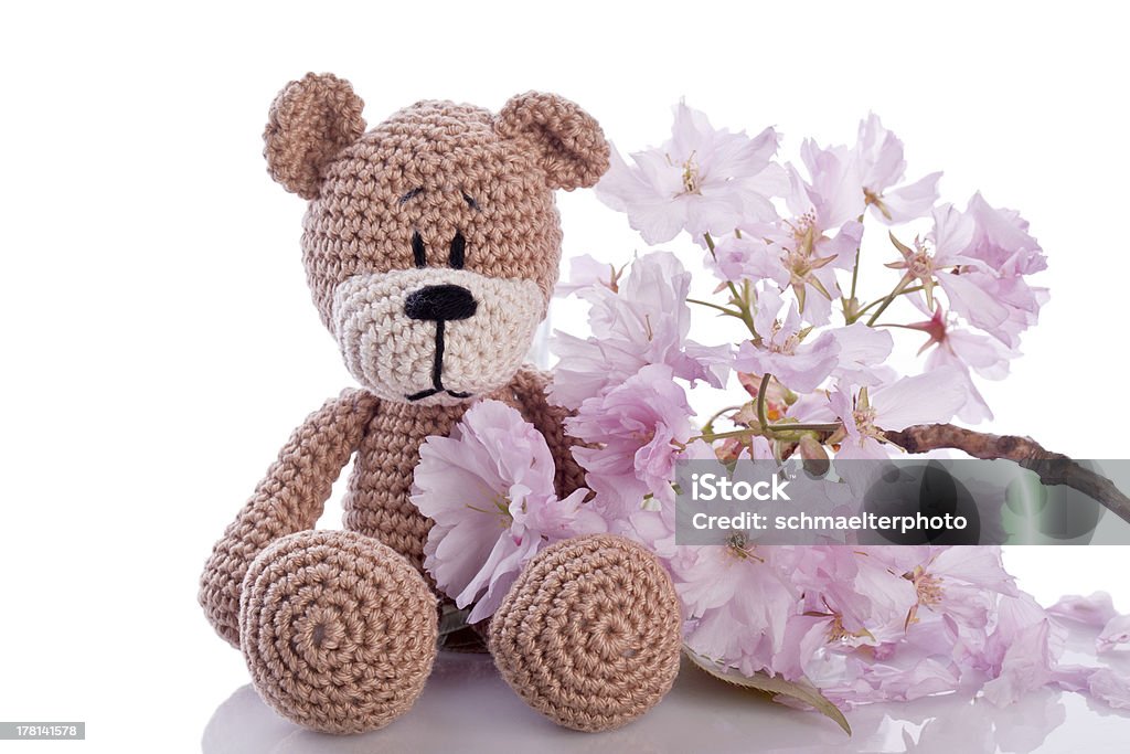 Ours en peluche et rose fleuri - Photo de Amigurumi libre de droits