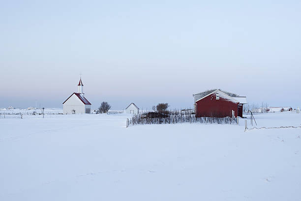 istock Farm in a grey, snowy weather 178141860