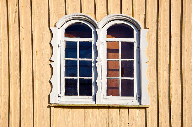 istock two windows on wooden church wall 178142296