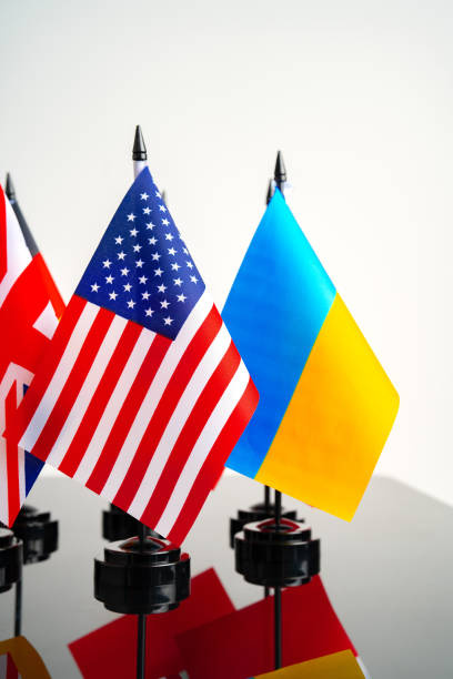 istock Lots of small national flags on table 1781429436