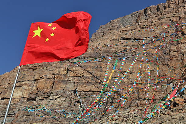 istock Chinese flaf and buddhist prayer flags 178144640