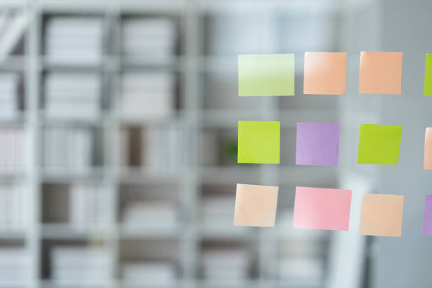 istock Business planning concept and sticky note on glass wall for information reminder. 1781452169